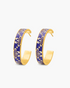 Pair of purple hoop earrings with gold accents on a white background