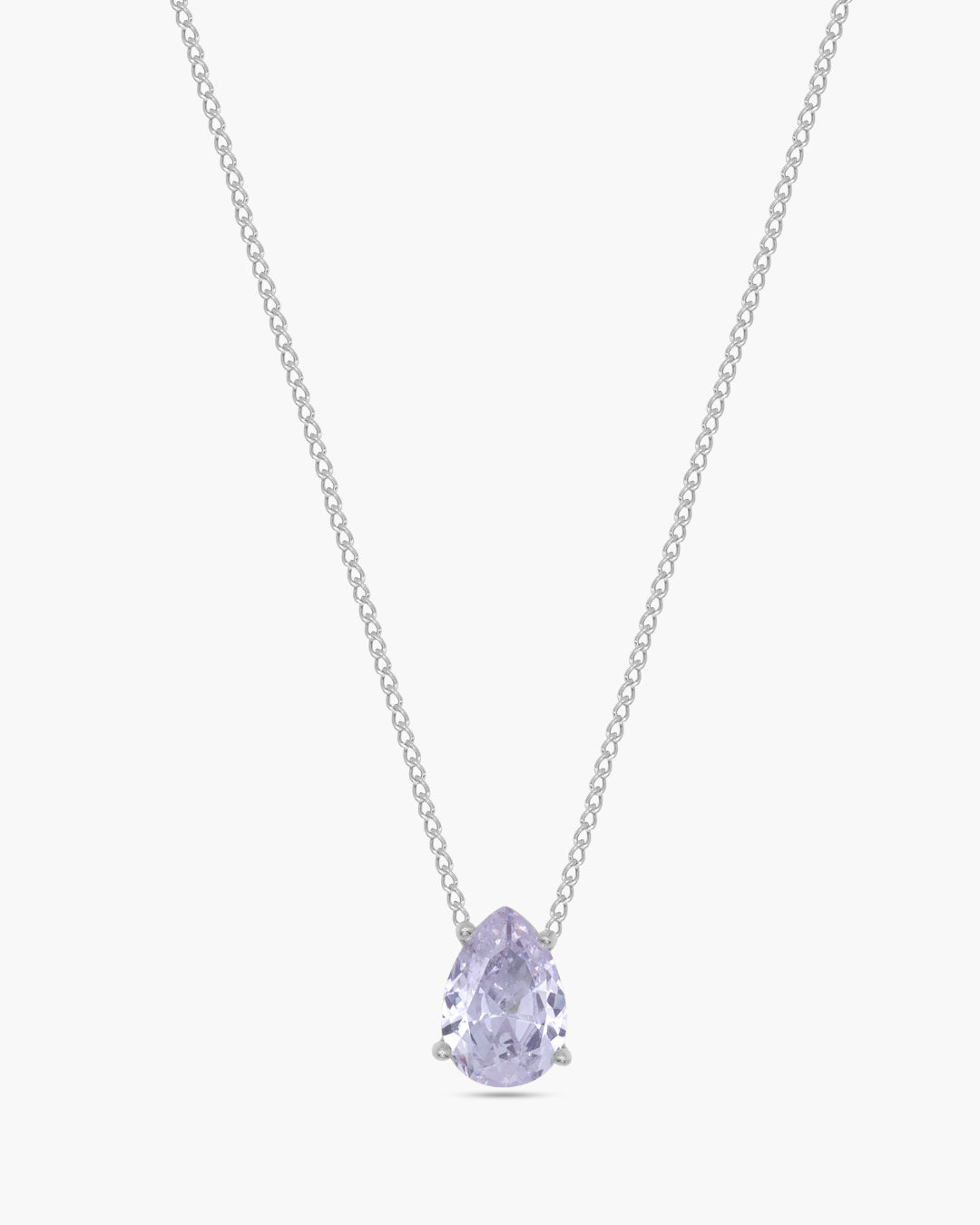 Silver necklace against a white background