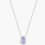 Silver necklace against a white background