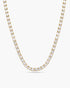 Gold necklace with clear stones on a white background