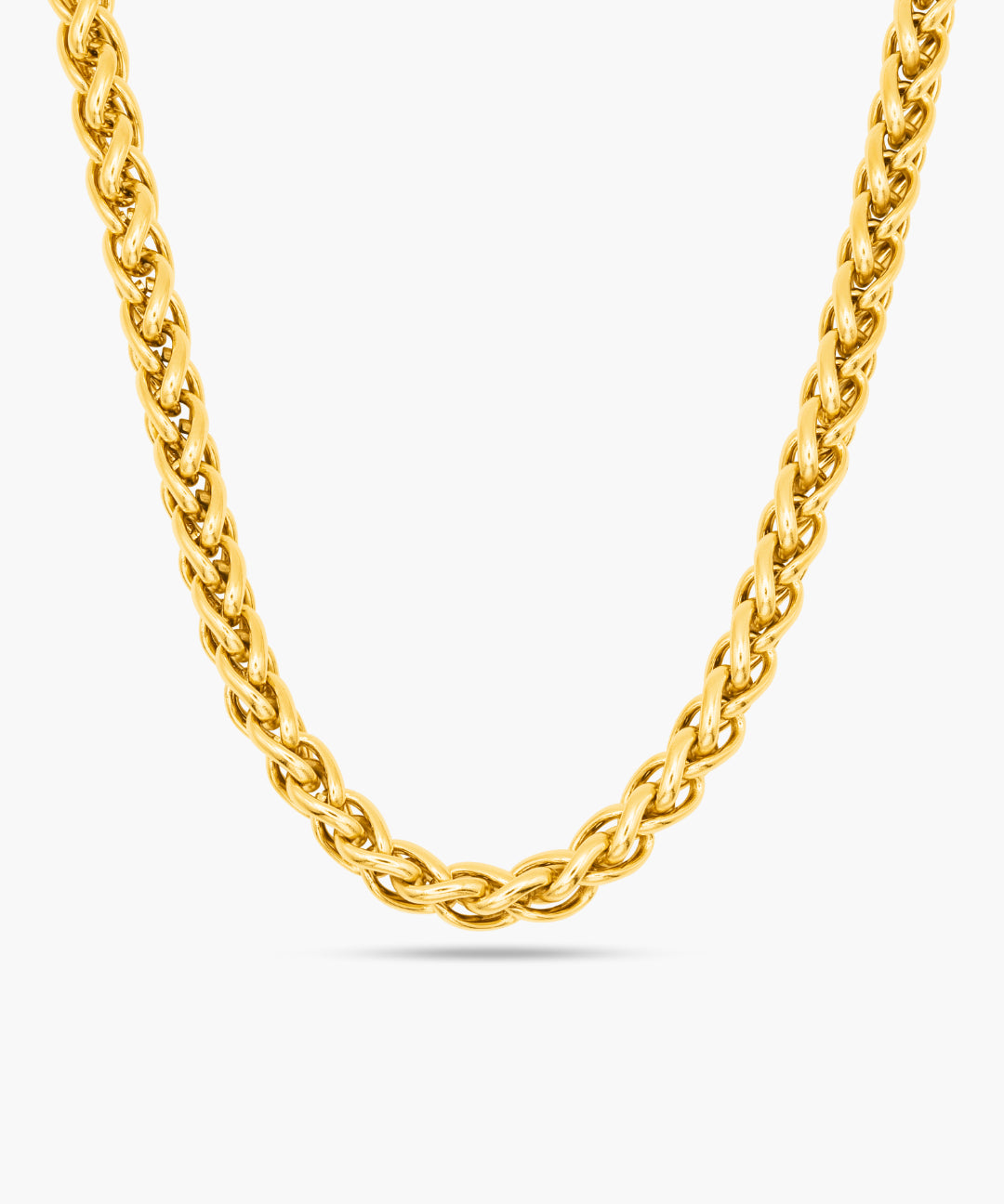 Gold chain necklace on a white background