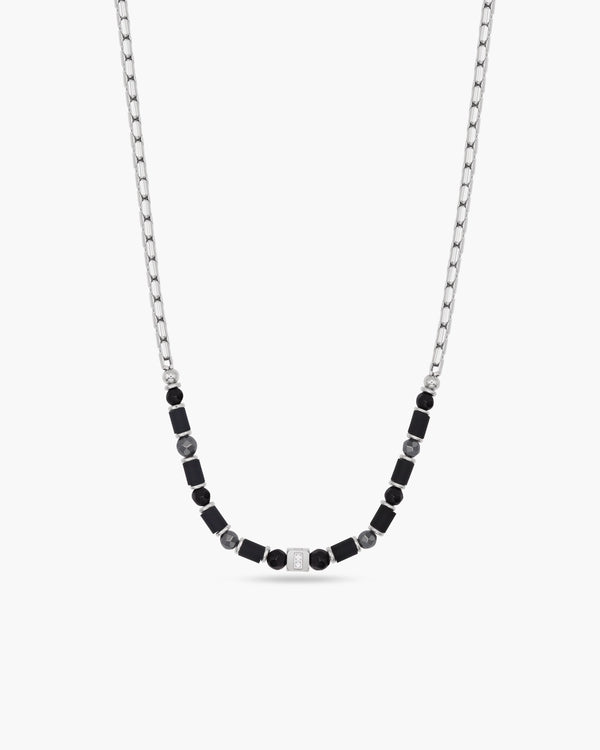 Necklace with black and gray beads on a white background