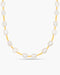 Pearl necklace with gold chain on a white background